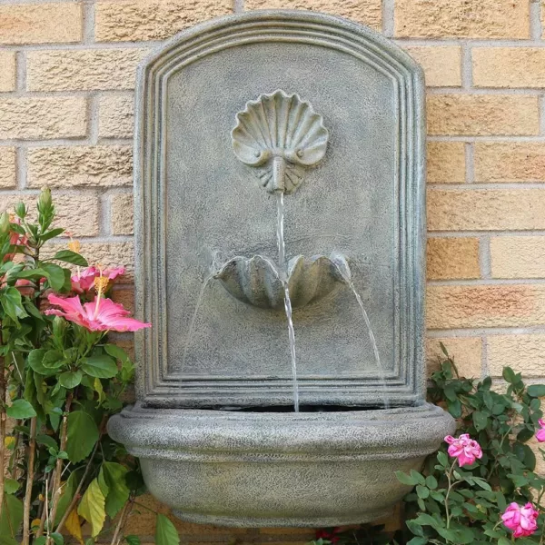 Sunnydaze Decor Seaside Resin French Limestone Solar Outdoor Wall Fountain