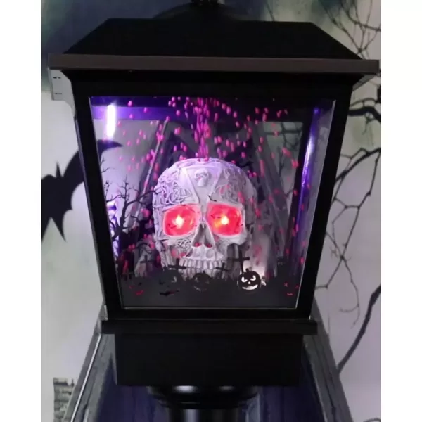 Haunted Hill Farm 71 in. Black Gruesome Skull Lamp Post with Animation and Spooky Music