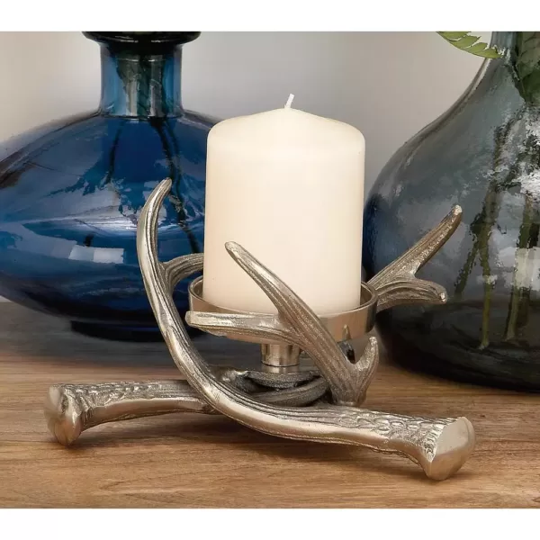 LITTON LANE 4 in. Silver Aluminum Crossed Antlers Candle Holder